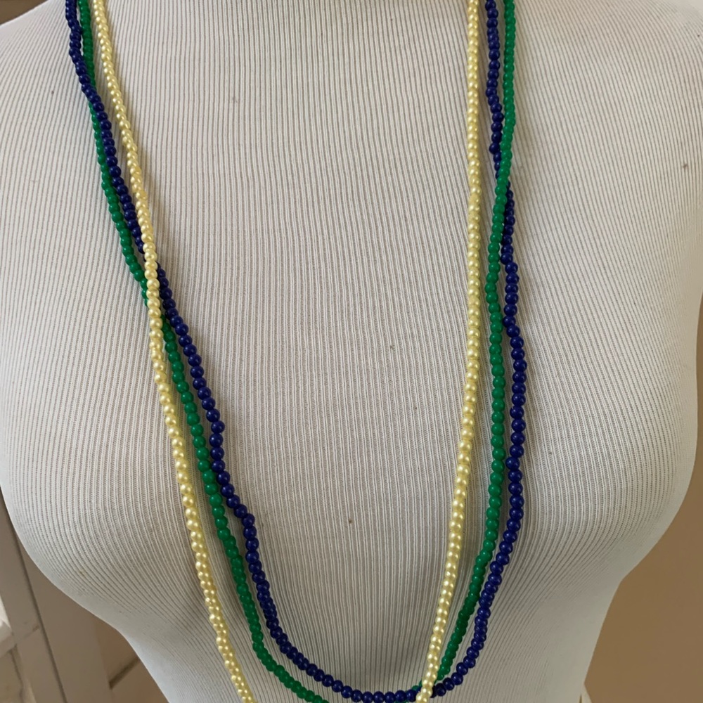 Three long beaded necklaces